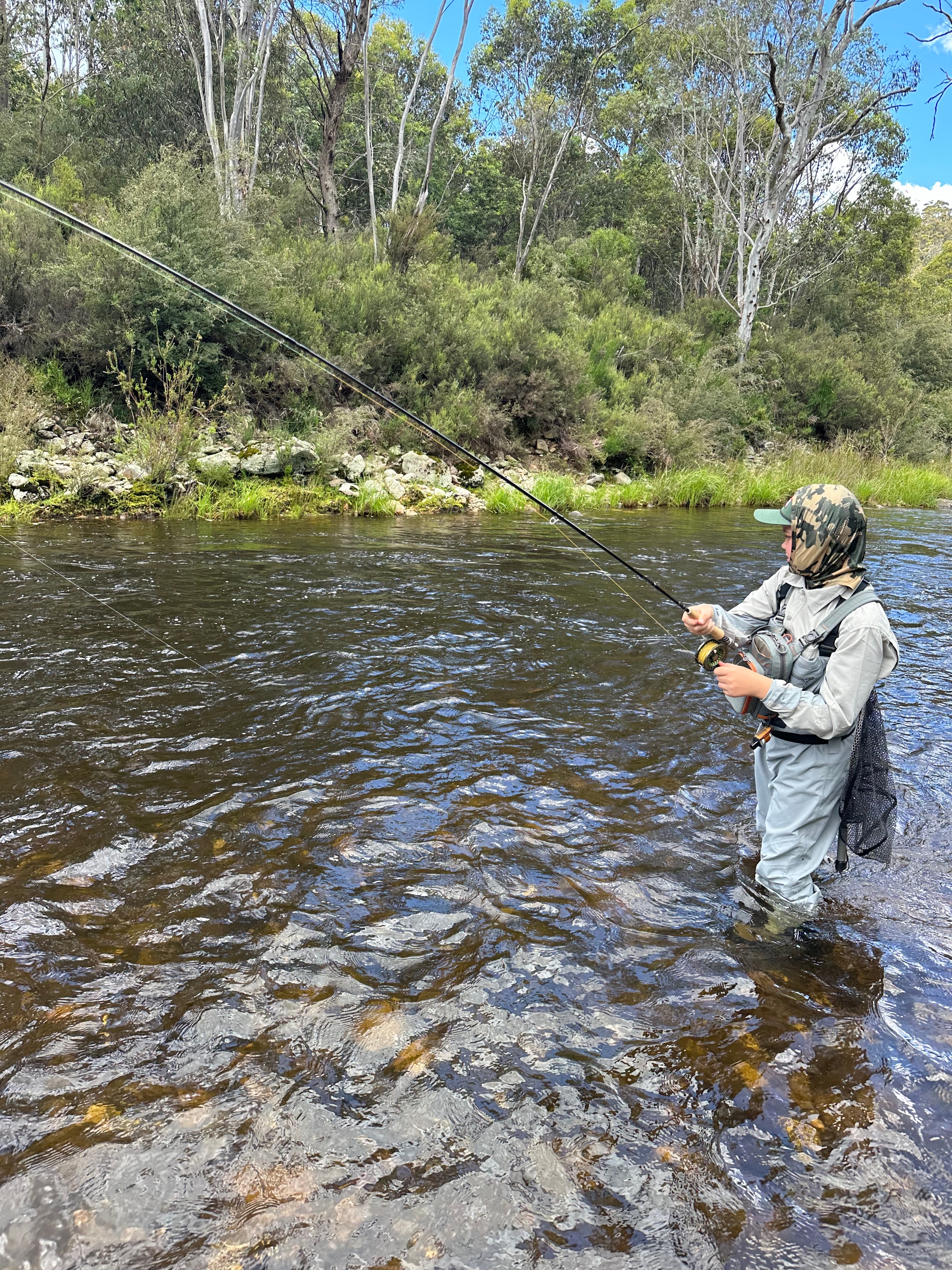 Fly fishing on a Victorian river at golden hour